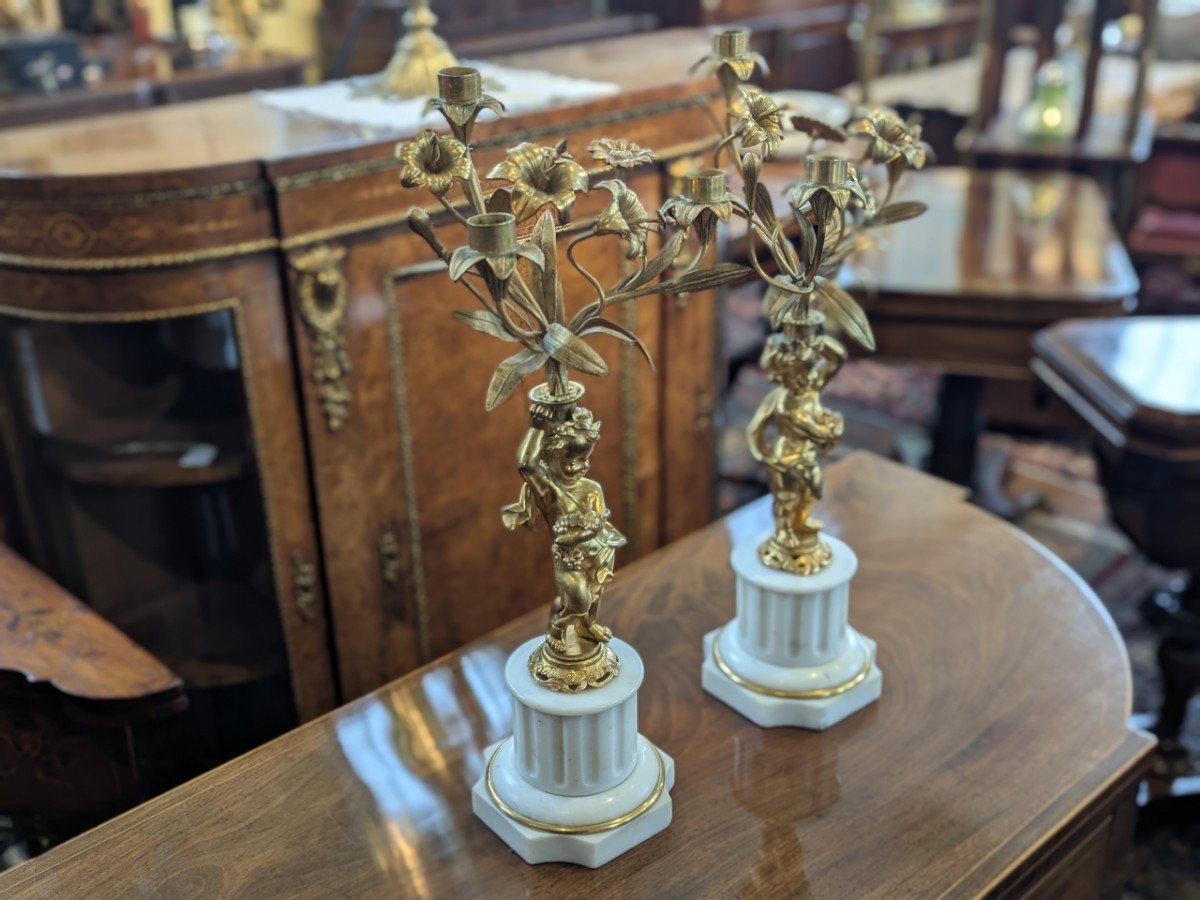 Pair Of Gilt-Bronze Candelabra Supported By Cherubs
